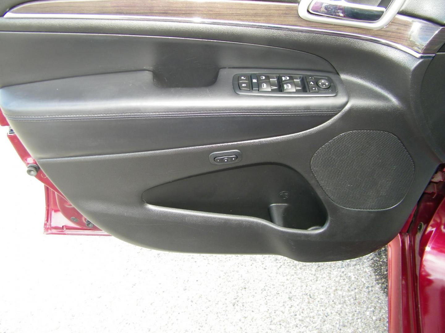 2016 Red /Black Jeep Grand Cherokee Overland 4WD (1C4RJFCG8GC) with an 3.6L V6 DOHC 24V engine, 8A transmission, located at 4000 Bee Ridge Road, Sarasota, FL, 34233, (941) 926-0300, 27.298664, -82.489151 - Photo#22