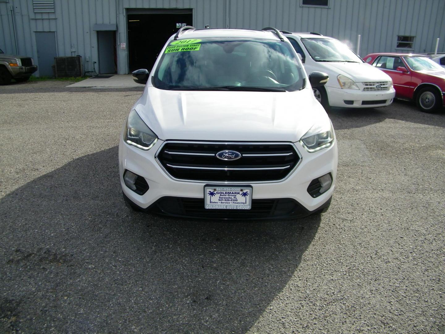 2017 WHITE /Black Ford Escape Titanium 4WD (1FMCU9J98HU) with an 2.0L L4 DOHC 16V engine, 6A transmission, located at 4000 Bee Ridge Road, Sarasota, FL, 34233, (941) 926-0300, 27.298664, -82.489151 - Photo#1