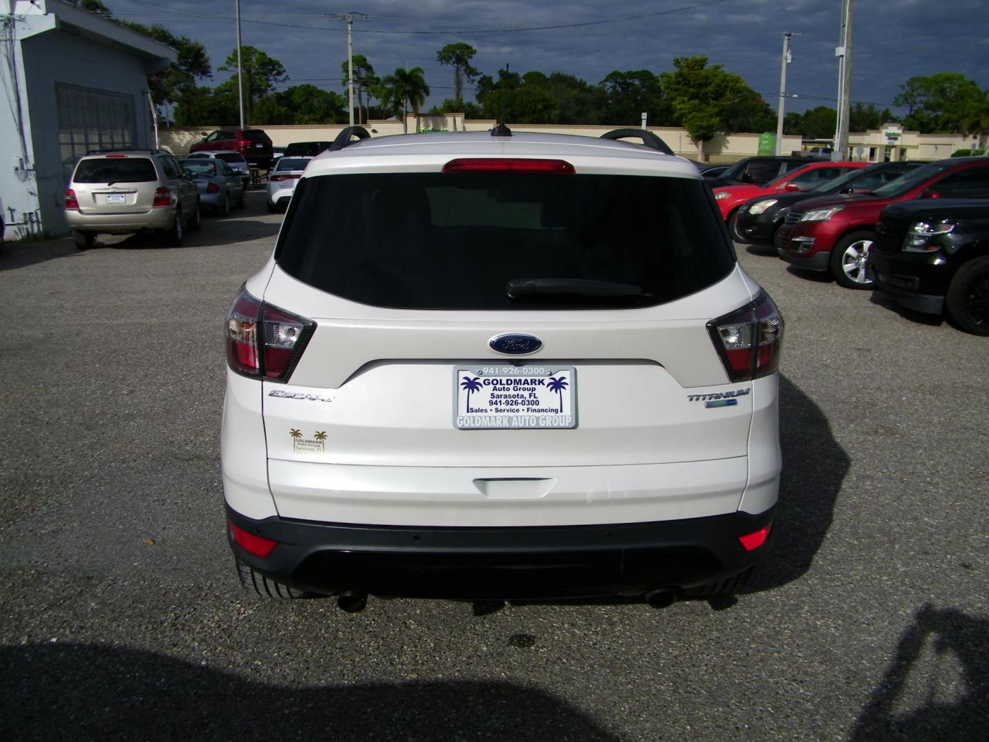 2017 WHITE /Black Ford Escape Titanium 4WD (1FMCU9J98HU) with an 2.0L L4 DOHC 16V engine, 6A transmission, located at 4000 Bee Ridge Road, Sarasota, FL, 34233, (941) 926-0300, 27.298664, -82.489151 - Photo#4