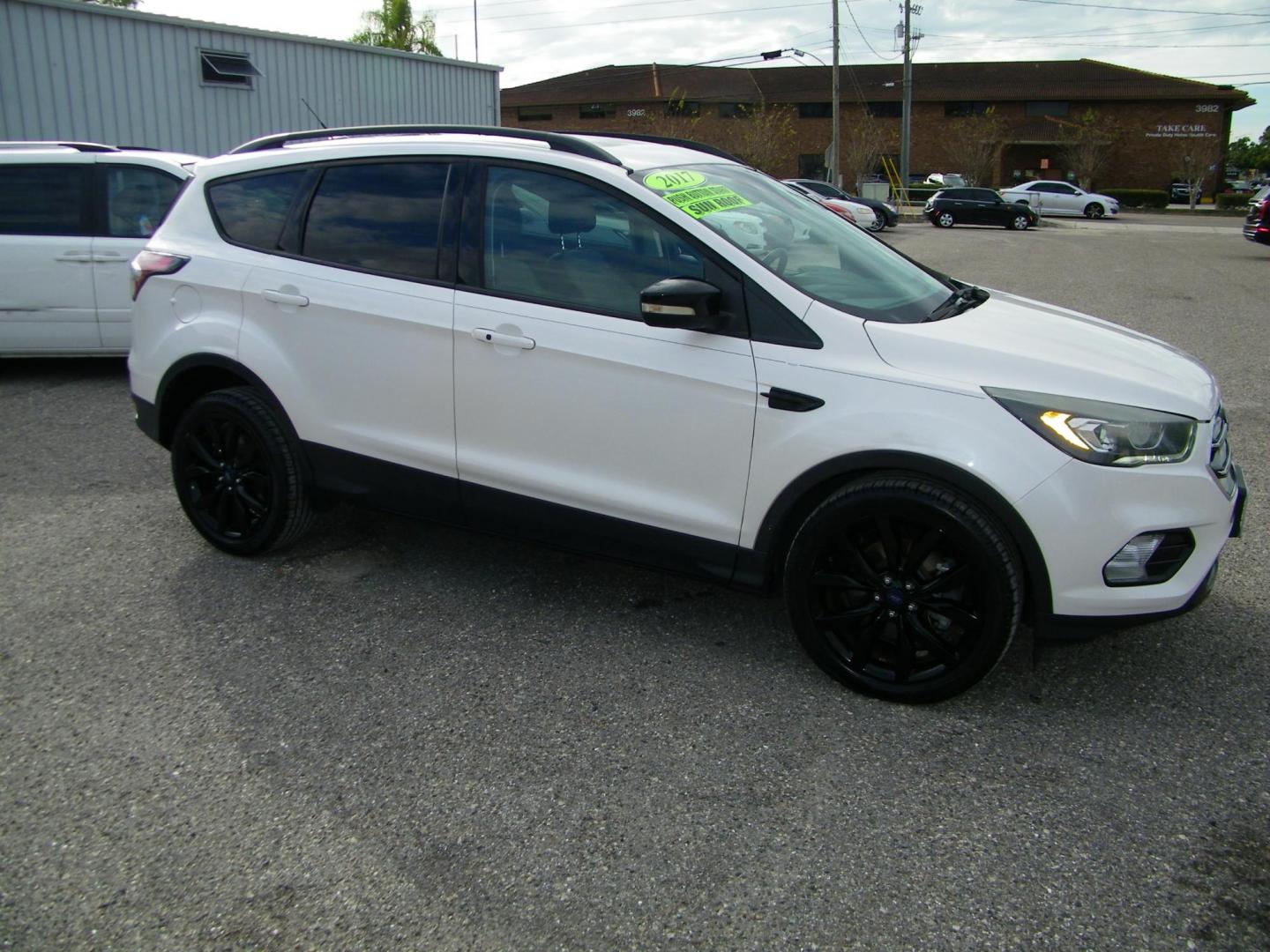 2017 WHITE /Black Ford Escape Titanium 4WD (1FMCU9J98HU) with an 2.0L L4 DOHC 16V engine, 6A transmission, located at 4000 Bee Ridge Road, Sarasota, FL, 34233, (941) 926-0300, 27.298664, -82.489151 - Photo#7