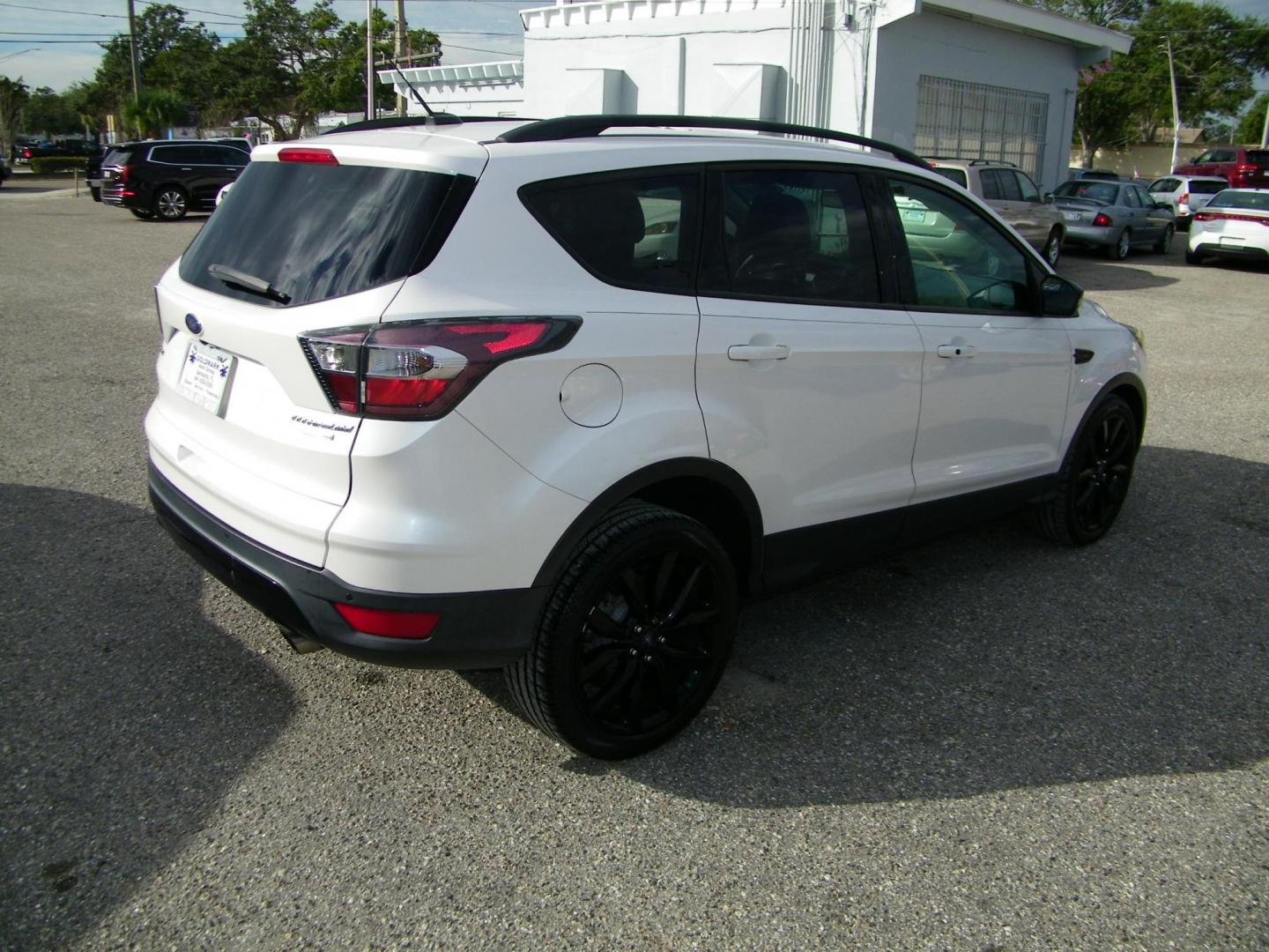 2017 WHITE /Black Ford Escape Titanium 4WD (1FMCU9J98HU) with an 2.0L L4 DOHC 16V engine, 6A transmission, located at 4000 Bee Ridge Road, Sarasota, FL, 34233, (941) 926-0300, 27.298664, -82.489151 - Photo#5