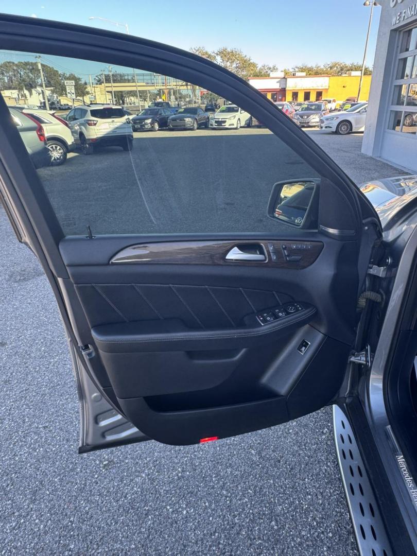 2015 Gray /Black Mercedes-Benz GL-Class GL450 4MATIC (4JGDF6EE2FA) with an 3.0L V6 DOHC 24V TURBO DIESEL engine, 7-Speed Automatic transmission, located at 4000 Bee Ridge Road, Sarasota, FL, 34233, (941) 926-0300, 27.298664, -82.489151 - Photo#5