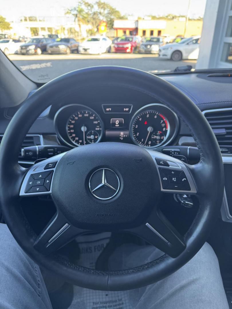 2015 Gray /Black Mercedes-Benz GL-Class GL450 4MATIC (4JGDF6EE2FA) with an 3.0L V6 DOHC 24V TURBO DIESEL engine, 7-Speed Automatic transmission, located at 4000 Bee Ridge Road, Sarasota, FL, 34233, (941) 926-0300, 27.298664, -82.489151 - Photo#9