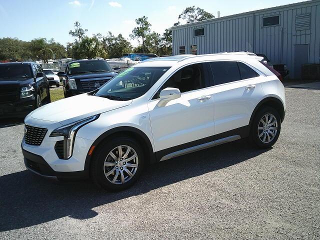 2021 White /Beige Cadillac XT4 Premium Luxury (1GYFZCR40MF) with an 2.0L L4 DOHC 16V engine, 9A transmission, located at 4000 Bee Ridge Road, Sarasota, FL, 34233, (941) 926-0300, 27.298664, -82.489151 - Photo#0