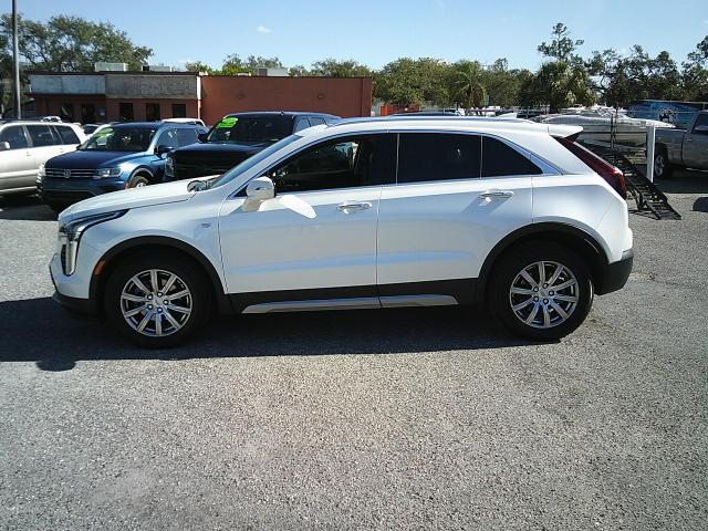 2021 White /Beige Cadillac XT4 Premium Luxury (1GYFZCR40MF) with an 2.0L L4 DOHC 16V engine, 9A transmission, located at 4000 Bee Ridge Road, Sarasota, FL, 34233, (941) 926-0300, 27.298664, -82.489151 - Photo#2