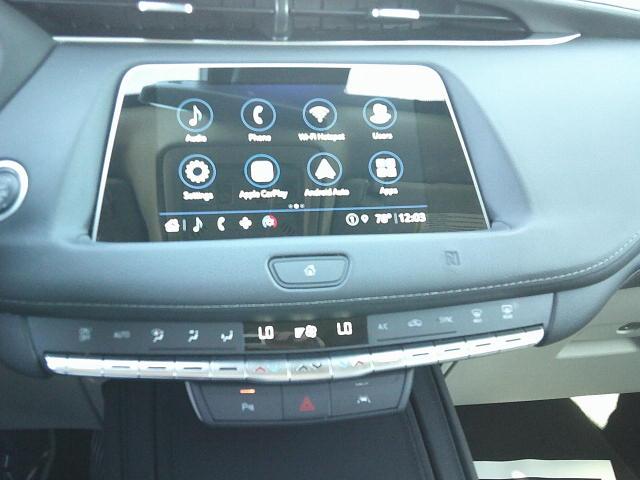 2021 White /Beige Cadillac XT4 Premium Luxury (1GYFZCR40MF) with an 2.0L L4 DOHC 16V engine, 9A transmission, located at 4000 Bee Ridge Road, Sarasota, FL, 34233, (941) 926-0300, 27.298664, -82.489151 - Photo#24