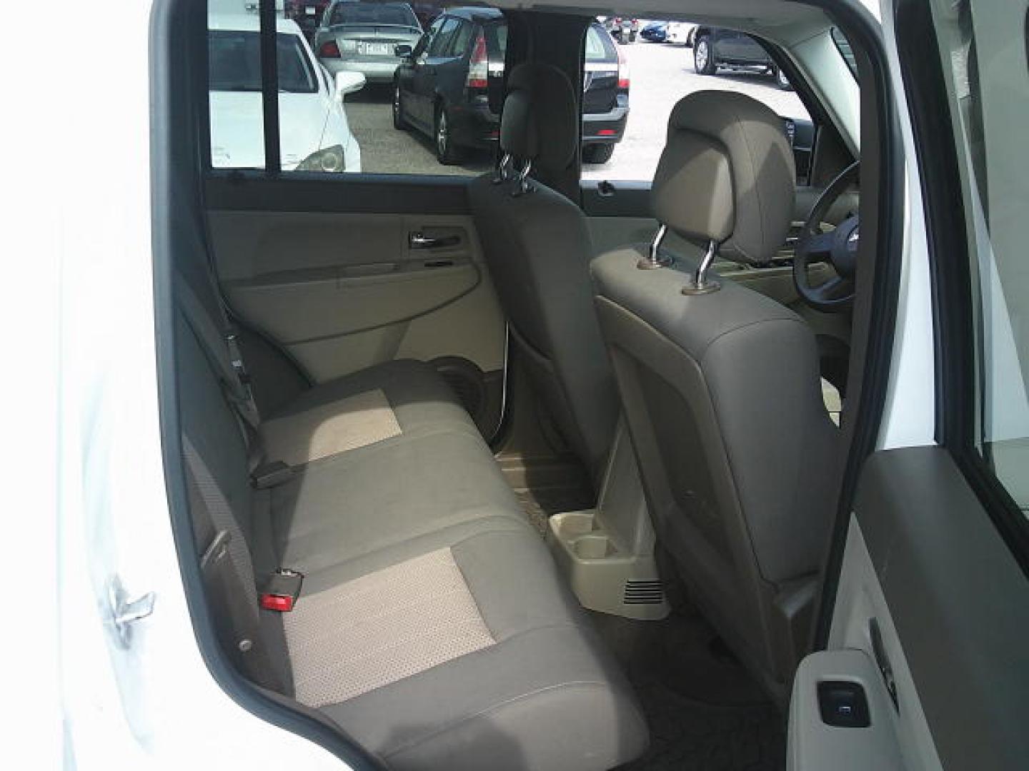 2010 WHITE /Grey Jeep Liberty Sport 2WD (1J4PP2GK4AW) with an 3.7L V6 SOHC 12V engine, 4-Speed Automatic transmission, located at 4000 Bee Ridge Road, Sarasota, FL, 34233, (941) 926-0300, 27.298664, -82.489151 - Photo#12