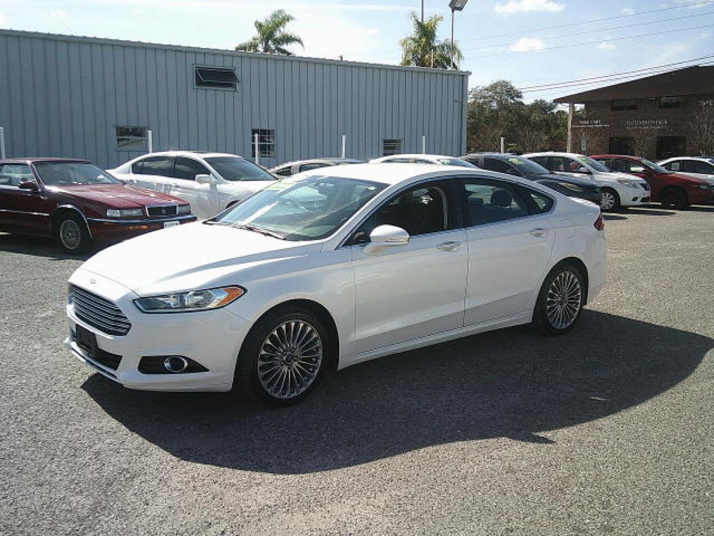 2013 WHITE /Black Ford Fusion Titanium (3FA6P0K93DR) with an 2.0L L4 DOHC 16V engine, Automatic transmission, located at 4000 Bee Ridge Road, Sarasota, FL, 34233, (941) 926-0300, 27.298664, -82.489151 - Photo#0