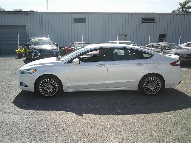 2013 WHITE /Black Ford Fusion Titanium (3FA6P0K93DR) with an 2.0L L4 DOHC 16V engine, Automatic transmission, located at 4000 Bee Ridge Road, Sarasota, FL, 34233, (941) 926-0300, 27.298664, -82.489151 - Photo#2