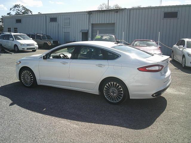 2013 WHITE /Black Ford Fusion Titanium (3FA6P0K93DR) with an 2.0L L4 DOHC 16V engine, Automatic transmission, located at 4000 Bee Ridge Road, Sarasota, FL, 34233, (941) 926-0300, 27.298664, -82.489151 - Photo#3