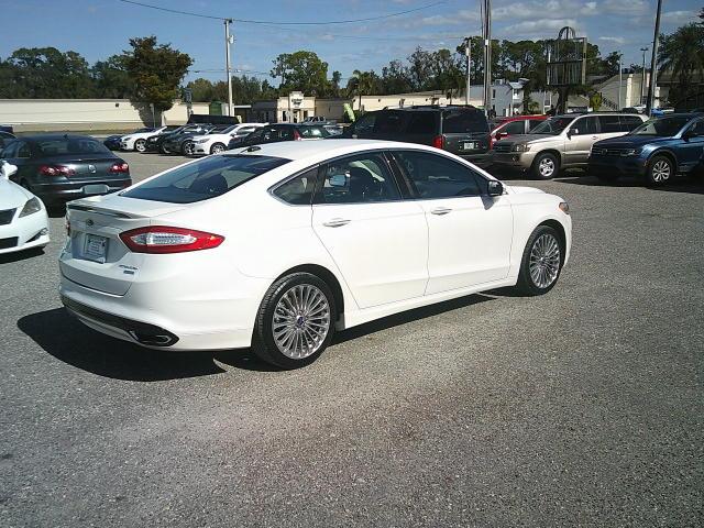 2013 WHITE /Black Ford Fusion Titanium (3FA6P0K93DR) with an 2.0L L4 DOHC 16V engine, Automatic transmission, located at 4000 Bee Ridge Road, Sarasota, FL, 34233, (941) 926-0300, 27.298664, -82.489151 - Photo#5