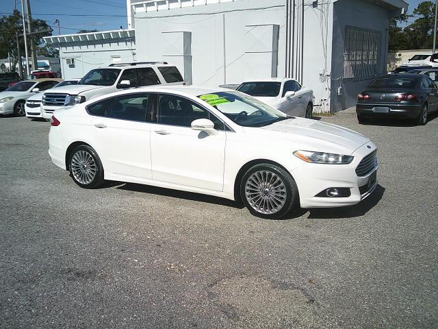 2013 WHITE /Black Ford Fusion Titanium (3FA6P0K93DR) with an 2.0L L4 DOHC 16V engine, Automatic transmission, located at 4000 Bee Ridge Road, Sarasota, FL, 34233, (941) 926-0300, 27.298664, -82.489151 - Photo#7