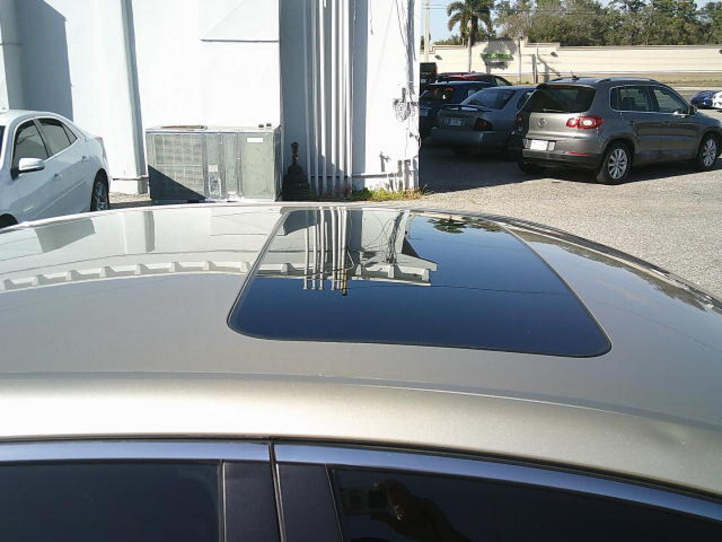 2011 Gold /Beige Hyundai Genesis 3.8L (KMHGC4DE5BU) with an 3.8L V6 DOHC 24V engine, 6-Speed Automatic transmission, located at 4000 Bee Ridge Road, Sarasota, FL, 34233, (941) 926-0300, 27.298664, -82.489151 - Photo#7