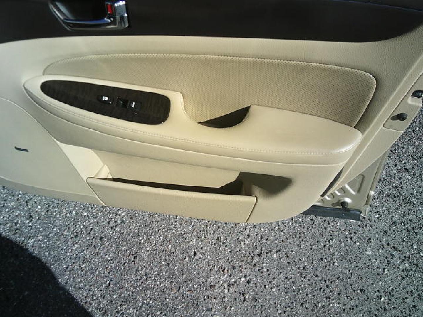 2011 Gold /Beige Hyundai Genesis 3.8L (KMHGC4DE5BU) with an 3.8L V6 DOHC 24V engine, 6-Speed Automatic transmission, located at 4000 Bee Ridge Road, Sarasota, FL, 34233, (941) 926-0300, 27.298664, -82.489151 - Photo#12