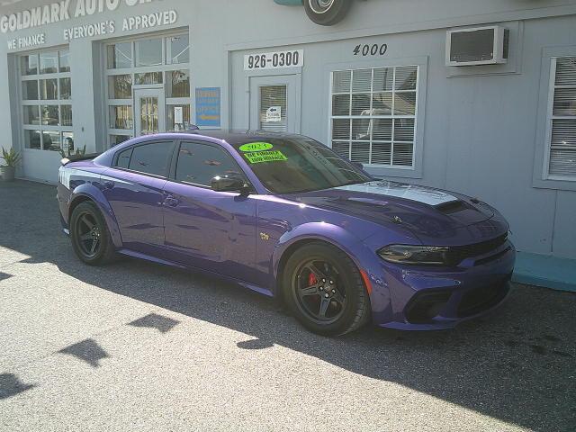 2023 Purple /Black Dodge Charger Scat Pack (2C3CDXGJ5PH) with an 6.4L V8 OHV 16V engine, Automatic transmission, located at 4000 Bee Ridge Road, Sarasota, FL, 34233, (941) 926-0300, 27.298664, -82.489151 - Photo#3