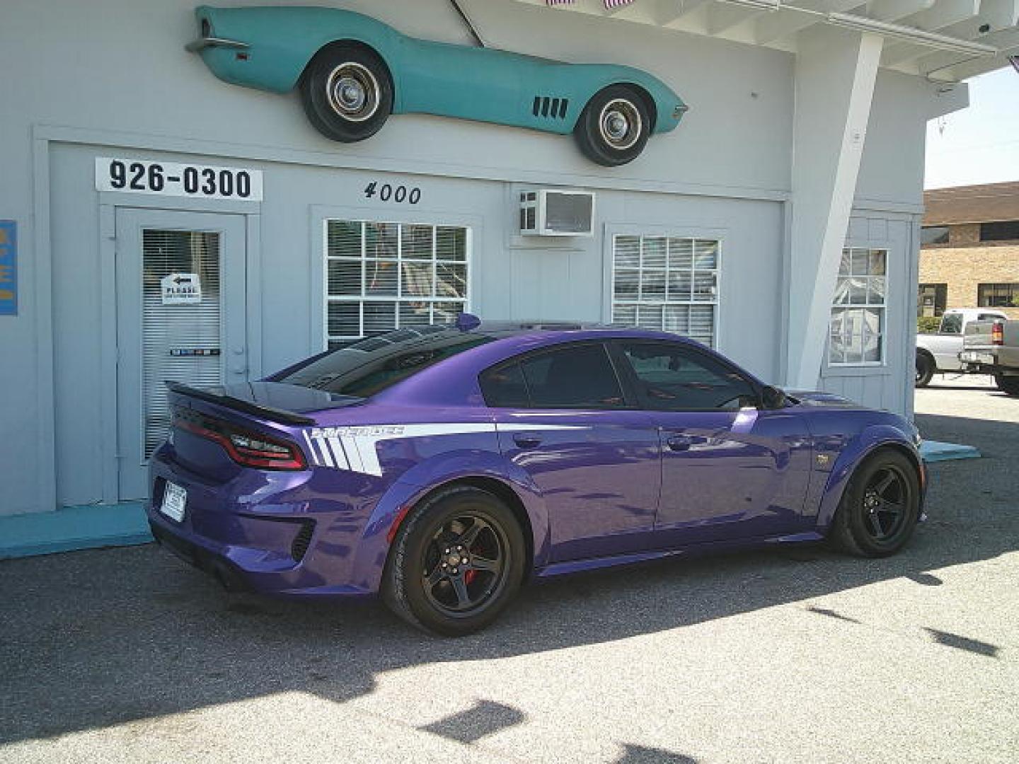 2023 Purple /Black Dodge Charger Scat Pack (2C3CDXGJ5PH) with an 6.4L V8 OHV 16V engine, Automatic transmission, located at 4000 Bee Ridge Road, Sarasota, FL, 34233, (941) 926-0300, 27.298664, -82.489151 - Photo#2