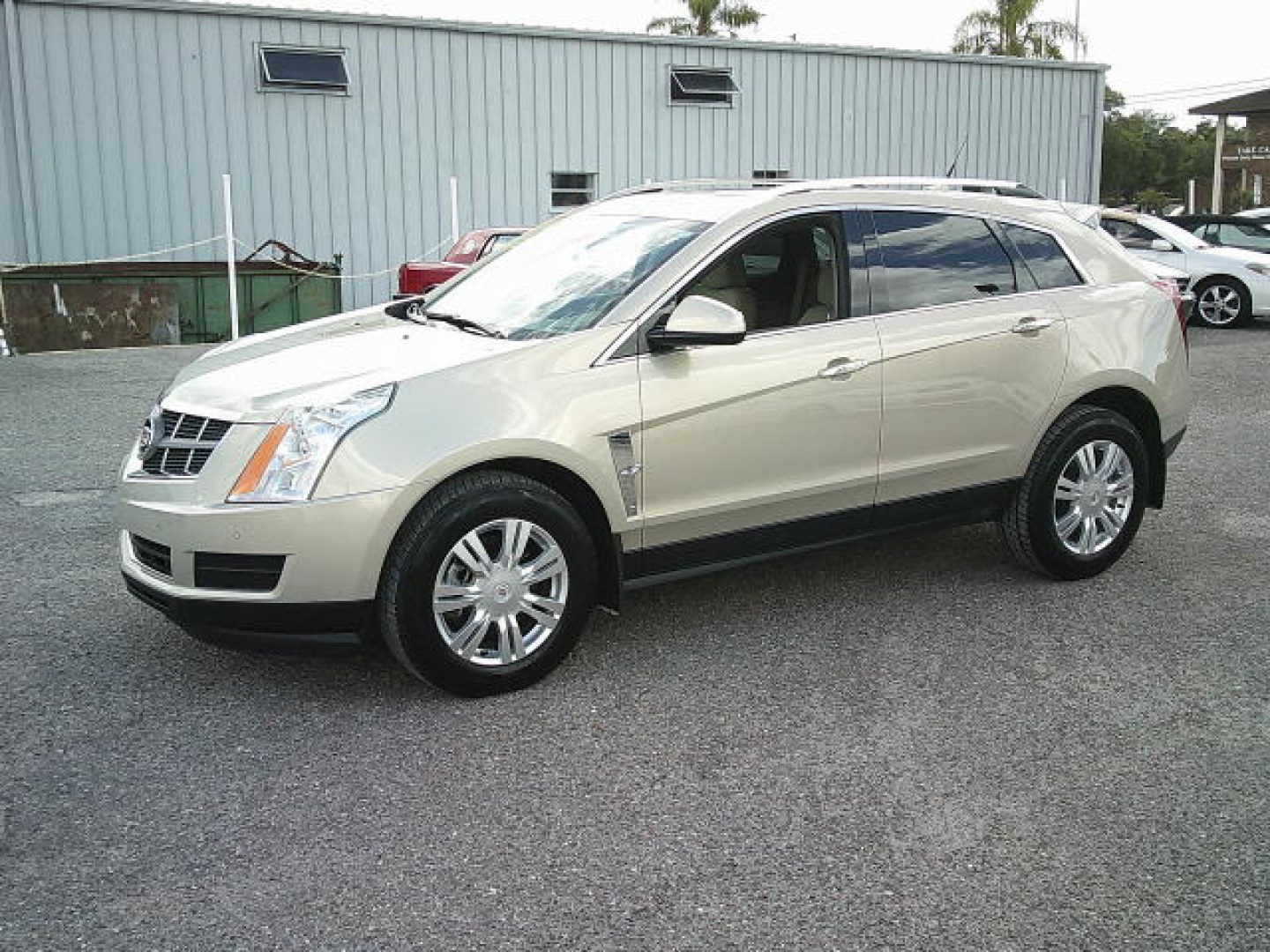 2011 Gold /Beige Cadillac SRX Luxury Collection (3GYFNAEYXBS) with an 3.0L V6 DOHC 24V engine, 6-Speed Automatic transmission, located at 4000 Bee Ridge Road, Sarasota, FL, 34233, (941) 926-0300, 27.298664, -82.489151- Photo#0
