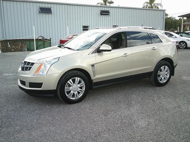 2011 Gold /Beige Cadillac SRX Luxury Collection (3GYFNAEYXBS) with an 3.0L V6 DOHC 24V engine, 6-Speed Automatic transmission, located at 4000 Bee Ridge Road, Sarasota, FL, 34233, (941) 926-0300, 27.298664, -82.489151 - Photo#0