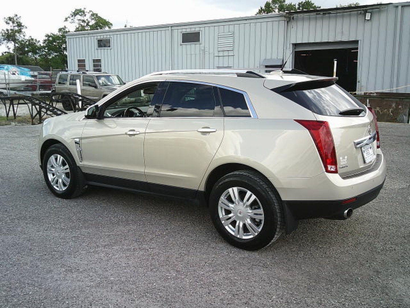 2011 Gold /Beige Cadillac SRX Luxury Collection (3GYFNAEYXBS) with an 3.0L V6 DOHC 24V engine, 6-Speed Automatic transmission, located at 4000 Bee Ridge Road, Sarasota, FL, 34233, (941) 926-0300, 27.298664, -82.489151- Photo#3