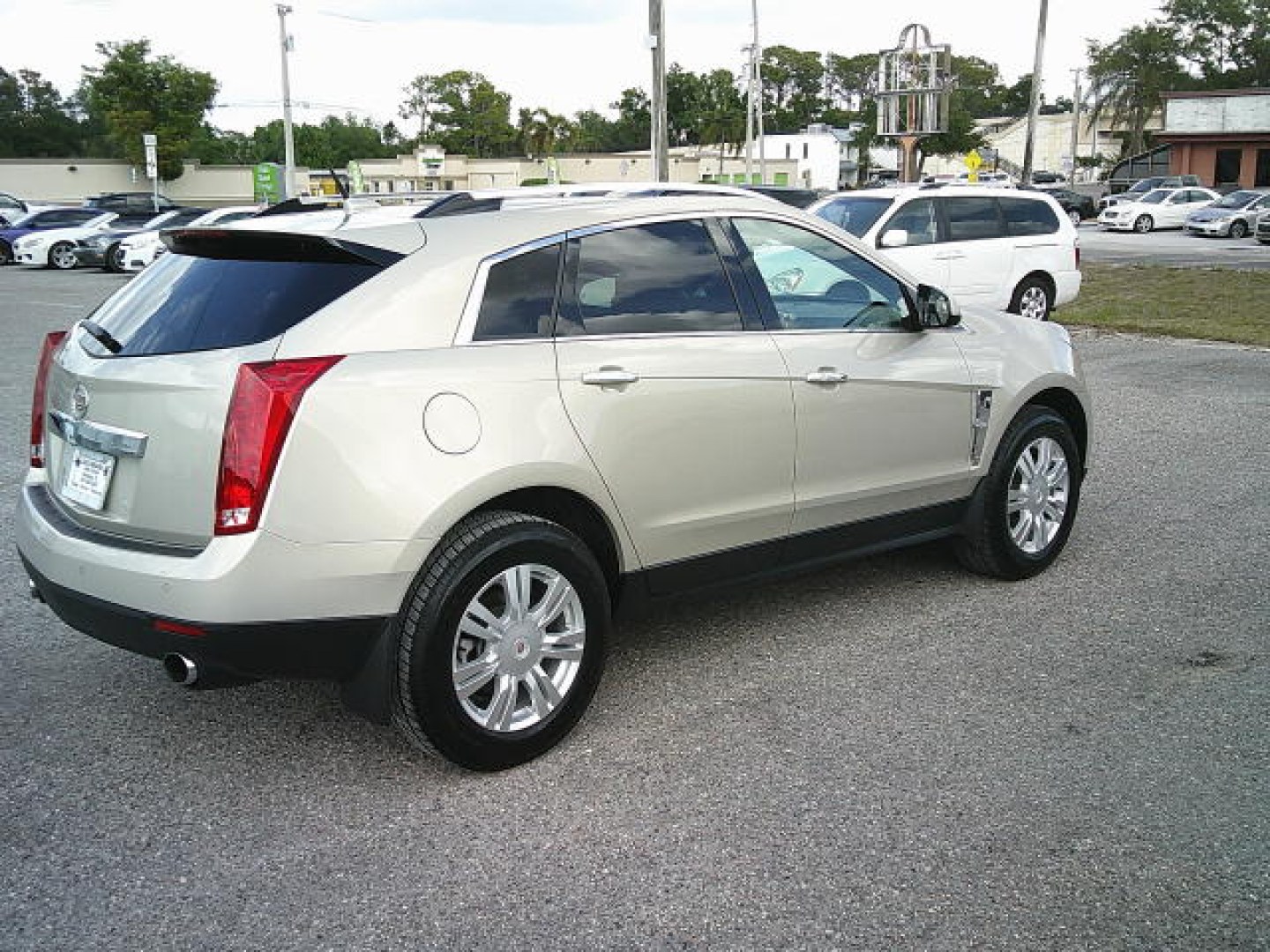 2011 Gold /Beige Cadillac SRX Luxury Collection (3GYFNAEYXBS) with an 3.0L V6 DOHC 24V engine, 6-Speed Automatic transmission, located at 4000 Bee Ridge Road, Sarasota, FL, 34233, (941) 926-0300, 27.298664, -82.489151- Photo#5