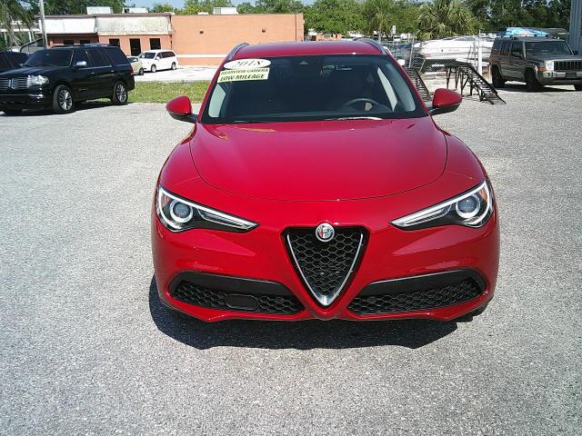2018 Red /Black Alfa Romeo Stelvio Base (ZASFAKAN7J7) with an 2.0L L4 DOHC 16V engine, 8A transmission, located at 4000 Bee Ridge Road, Sarasota, FL, 34233, (941) 926-0300, 27.298664, -82.489151 - Photo#1