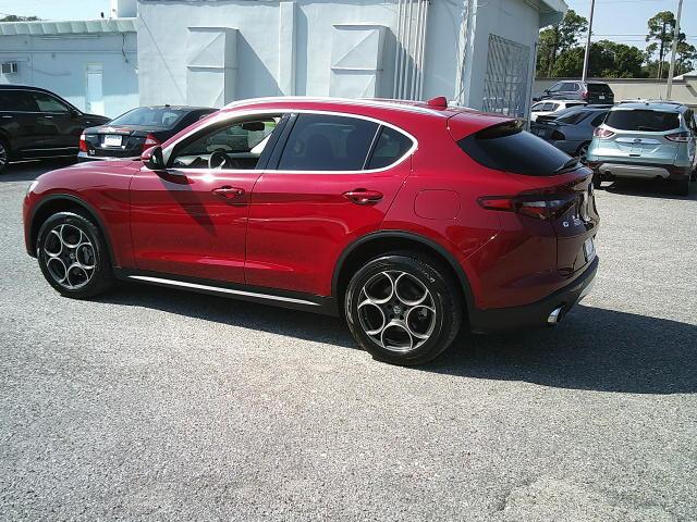 2018 Red /Black Alfa Romeo Stelvio Base (ZASFAKAN7J7) with an 2.0L L4 DOHC 16V engine, 8A transmission, located at 4000 Bee Ridge Road, Sarasota, FL, 34233, (941) 926-0300, 27.298664, -82.489151 - Photo#3