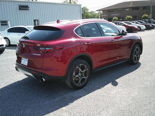2018 Red /Black Alfa Romeo Stelvio Base (ZASFAKAN7J7) with an 2.0L L4 DOHC 16V engine, 8A transmission, located at 4000 Bee Ridge Road, Sarasota, FL, 34233, (941) 926-0300, 27.298664, -82.489151 - Photo#5