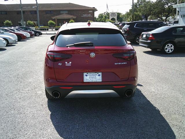 2018 Red /Black Alfa Romeo Stelvio Base (ZASFAKAN7J7) with an 2.0L L4 DOHC 16V engine, 8A transmission, located at 4000 Bee Ridge Road, Sarasota, FL, 34233, (941) 926-0300, 27.298664, -82.489151 - Photo#4