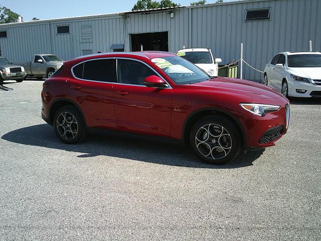2018 Red /Black Alfa Romeo Stelvio Base (ZASFAKAN7J7) with an 2.0L L4 DOHC 16V engine, 8A transmission, located at 4000 Bee Ridge Road, Sarasota, FL, 34233, (941) 926-0300, 27.298664, -82.489151 - Photo#7