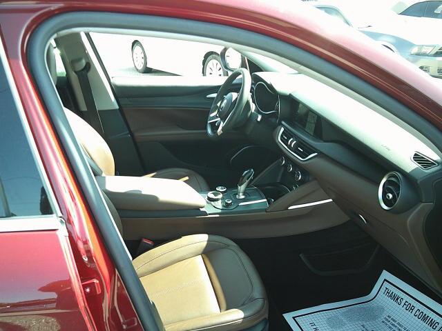2018 Red /Black Alfa Romeo Stelvio Base (ZASFAKAN7J7) with an 2.0L L4 DOHC 16V engine, 8A transmission, located at 4000 Bee Ridge Road, Sarasota, FL, 34233, (941) 926-0300, 27.298664, -82.489151 - Photo#16