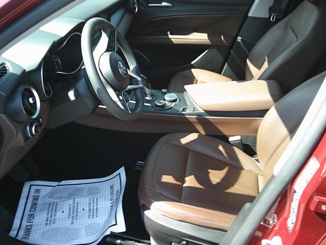 2018 Red /Black Alfa Romeo Stelvio Base (ZASFAKAN7J7) with an 2.0L L4 DOHC 16V engine, 8A transmission, located at 4000 Bee Ridge Road, Sarasota, FL, 34233, (941) 926-0300, 27.298664, -82.489151 - Photo#20