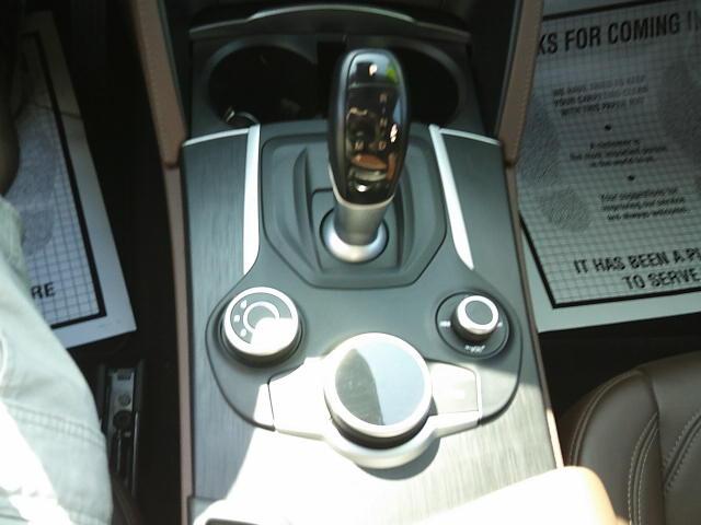 2018 Red /Black Alfa Romeo Stelvio Base (ZASFAKAN7J7) with an 2.0L L4 DOHC 16V engine, 8A transmission, located at 4000 Bee Ridge Road, Sarasota, FL, 34233, (941) 926-0300, 27.298664, -82.489151 - Photo#21