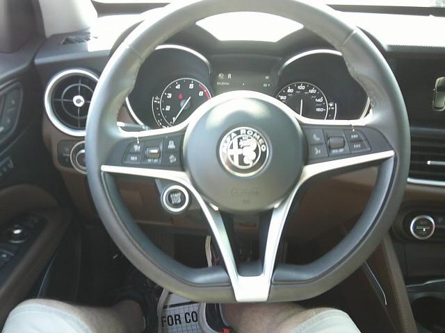 2018 Red /Black Alfa Romeo Stelvio Base (ZASFAKAN7J7) with an 2.0L L4 DOHC 16V engine, 8A transmission, located at 4000 Bee Ridge Road, Sarasota, FL, 34233, (941) 926-0300, 27.298664, -82.489151 - Photo#25