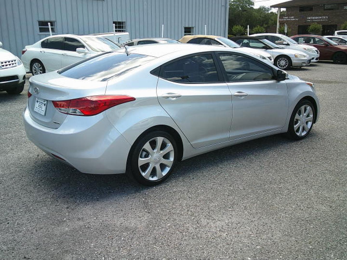 2012 Silver /Gray Hyundai Elantra Limited (5NPDH4AE1CH) with an 1.8L L4 DOHC 16V engine, 6-Speed Automatic transmission, located at 4000 Bee Ridge Road, Sarasota, FL, 34233, (941) 926-0300, 27.298664, -82.489151 - Photo#5