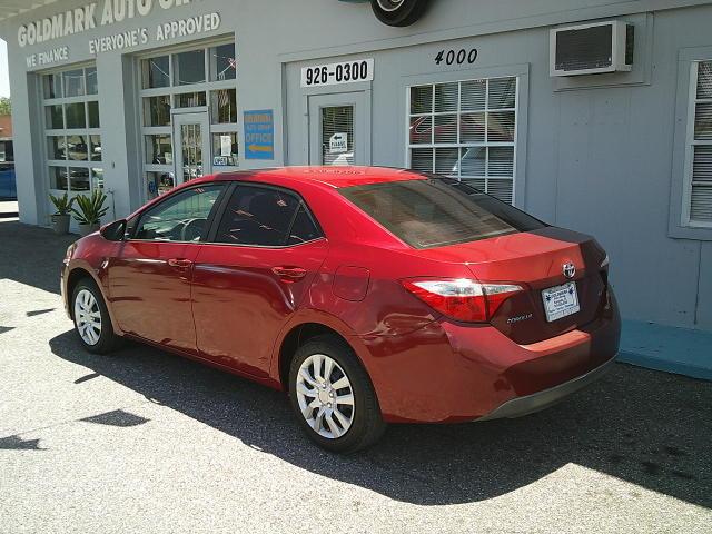 2014 Red /Grey Toyota Corolla L 4-Speed AT (5YFBURHE5EP) with an 1.8L L4 DOHC 16V engine, 4-Speed Automatic transmission, located at 4000 Bee Ridge Road, Sarasota, FL, 34233, (941) 926-0300, 27.298664, -82.489151 - Photo#3