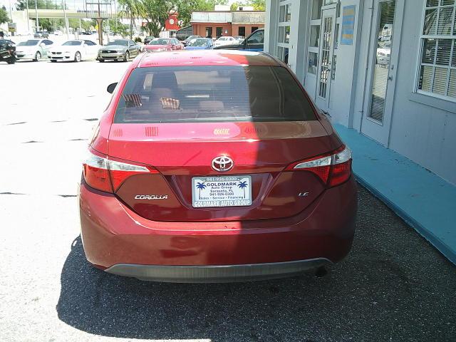 2014 Red /Grey Toyota Corolla L 4-Speed AT (5YFBURHE5EP) with an 1.8L L4 DOHC 16V engine, 4-Speed Automatic transmission, located at 4000 Bee Ridge Road, Sarasota, FL, 34233, (941) 926-0300, 27.298664, -82.489151 - Photo#4