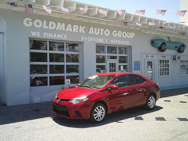 2014 Red /Grey Toyota Corolla L 4-Speed AT (5YFBURHE5EP) with an 1.8L L4 DOHC 16V engine, 4-Speed Automatic transmission, located at 4000 Bee Ridge Road, Sarasota, FL, 34233, (941) 926-0300, 27.298664, -82.489151 - Photo#5