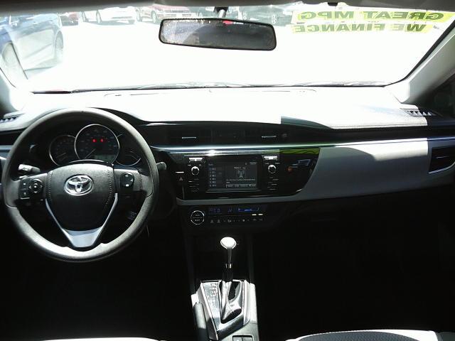 2014 Red /Grey Toyota Corolla L 4-Speed AT (5YFBURHE5EP) with an 1.8L L4 DOHC 16V engine, 4-Speed Automatic transmission, located at 4000 Bee Ridge Road, Sarasota, FL, 34233, (941) 926-0300, 27.298664, -82.489151 - Photo#11