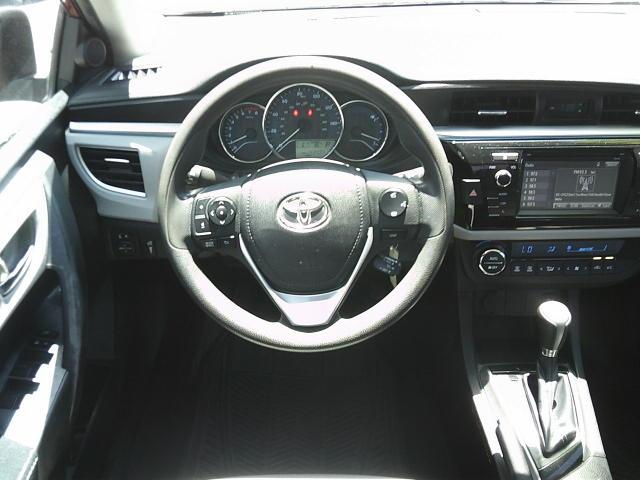 2014 Red /Grey Toyota Corolla L 4-Speed AT (5YFBURHE5EP) with an 1.8L L4 DOHC 16V engine, 4-Speed Automatic transmission, located at 4000 Bee Ridge Road, Sarasota, FL, 34233, (941) 926-0300, 27.298664, -82.489151 - Photo#12