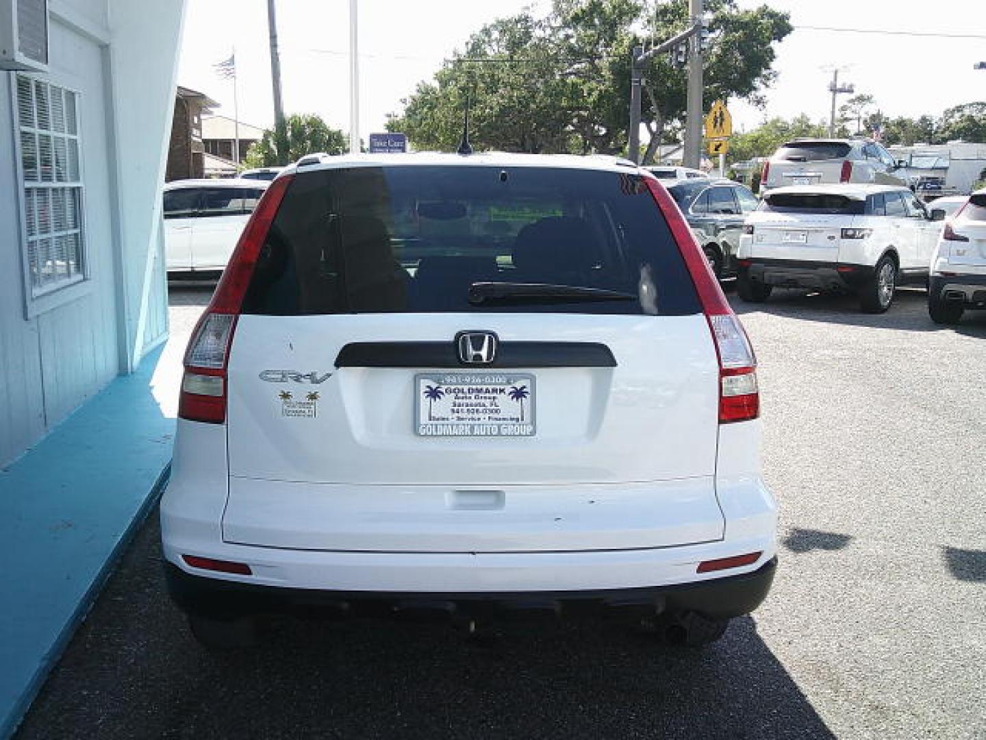 2011 WHITE /Black Honda CR-V LX 2WD 5-Speed AT (3CZRE3H37BG) with an 2.4L L4 DOHC 16V engine, 5-Speed Automatic transmission, located at 4000 Bee Ridge Road, Sarasota, FL, 34233, (941) 926-0300, 27.298664, -82.489151- Photo#6