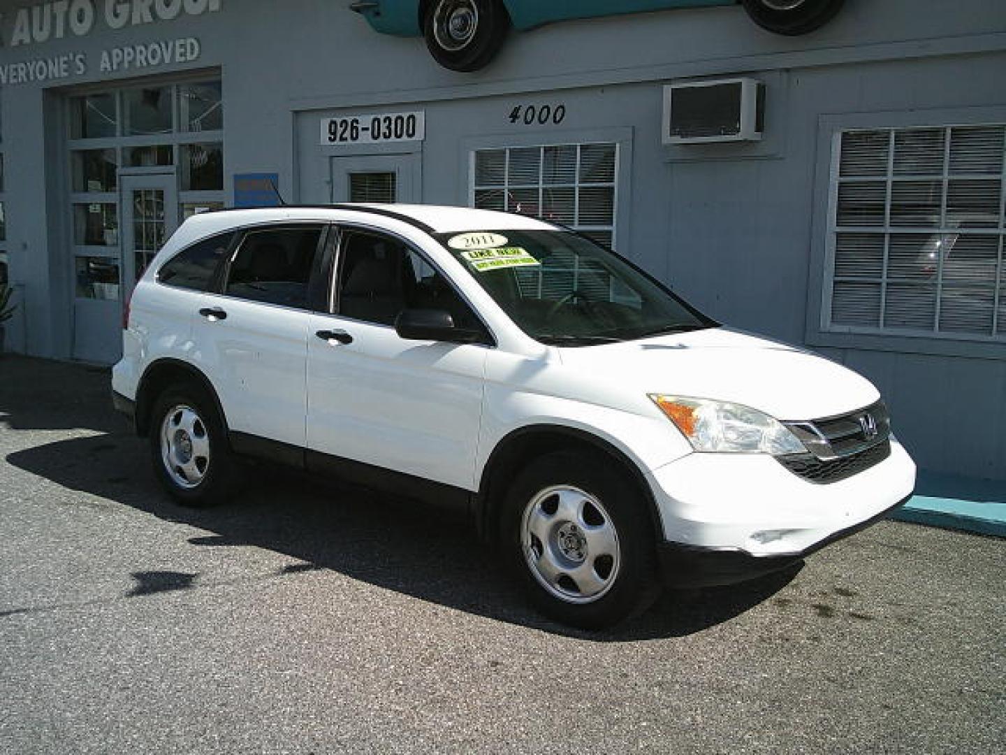 2011 WHITE /Black Honda CR-V LX 2WD 5-Speed AT (3CZRE3H37BG) with an 2.4L L4 DOHC 16V engine, 5-Speed Automatic transmission, located at 4000 Bee Ridge Road, Sarasota, FL, 34233, (941) 926-0300, 27.298664, -82.489151- Photo#2