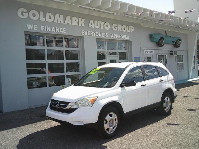 2011 WHITE /Black Honda CR-V LX 2WD 5-Speed AT (3CZRE3H37BG) with an 2.4L L4 DOHC 16V engine, 5-Speed Automatic transmission, located at 4000 Bee Ridge Road, Sarasota, FL, 34233, (941) 926-0300, 27.298664, -82.489151 - Photo#0