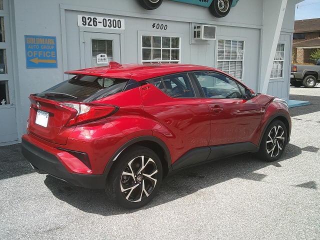 2021 Red /Black Toyota C-HR XLE (NMTKHMBX4MR) with an 2.0L L4 DOHC 16V engine, CVT transmission, located at 4000 Bee Ridge Road, Sarasota, FL, 34233, (941) 926-0300, 27.298664, -82.489151 - Photo#3