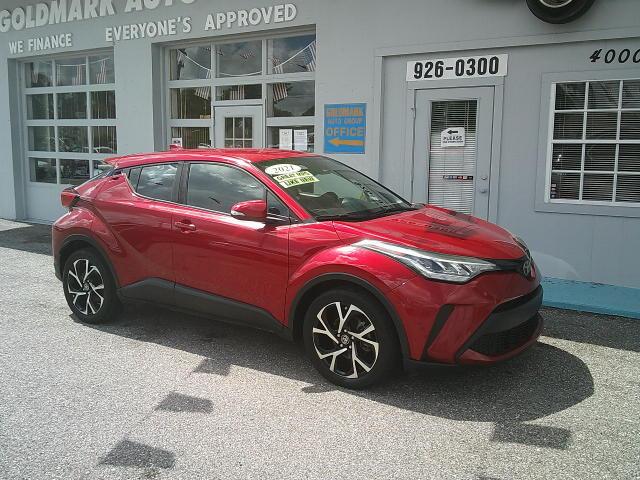 2021 Red /Black Toyota C-HR XLE (NMTKHMBX4MR) with an 2.0L L4 DOHC 16V engine, CVT transmission, located at 4000 Bee Ridge Road, Sarasota, FL, 34233, (941) 926-0300, 27.298664, -82.489151 - Photo#4