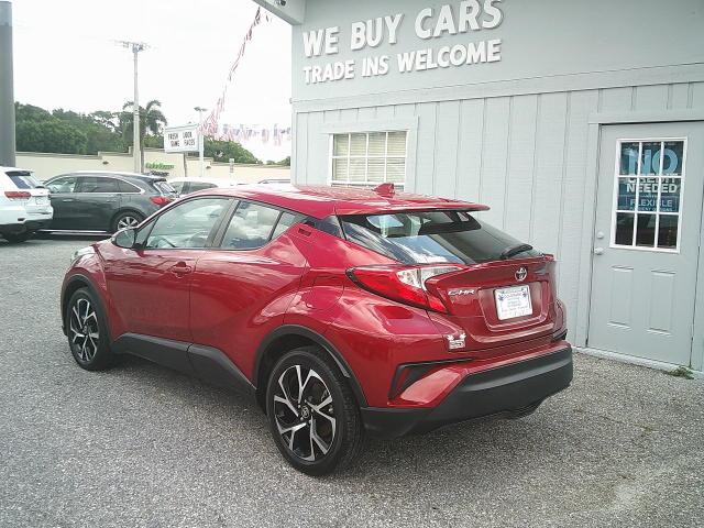 2021 Red /Black Toyota C-HR XLE (NMTKHMBX4MR) with an 2.0L L4 DOHC 16V engine, CVT transmission, located at 4000 Bee Ridge Road, Sarasota, FL, 34233, (941) 926-0300, 27.298664, -82.489151 - Photo#6
