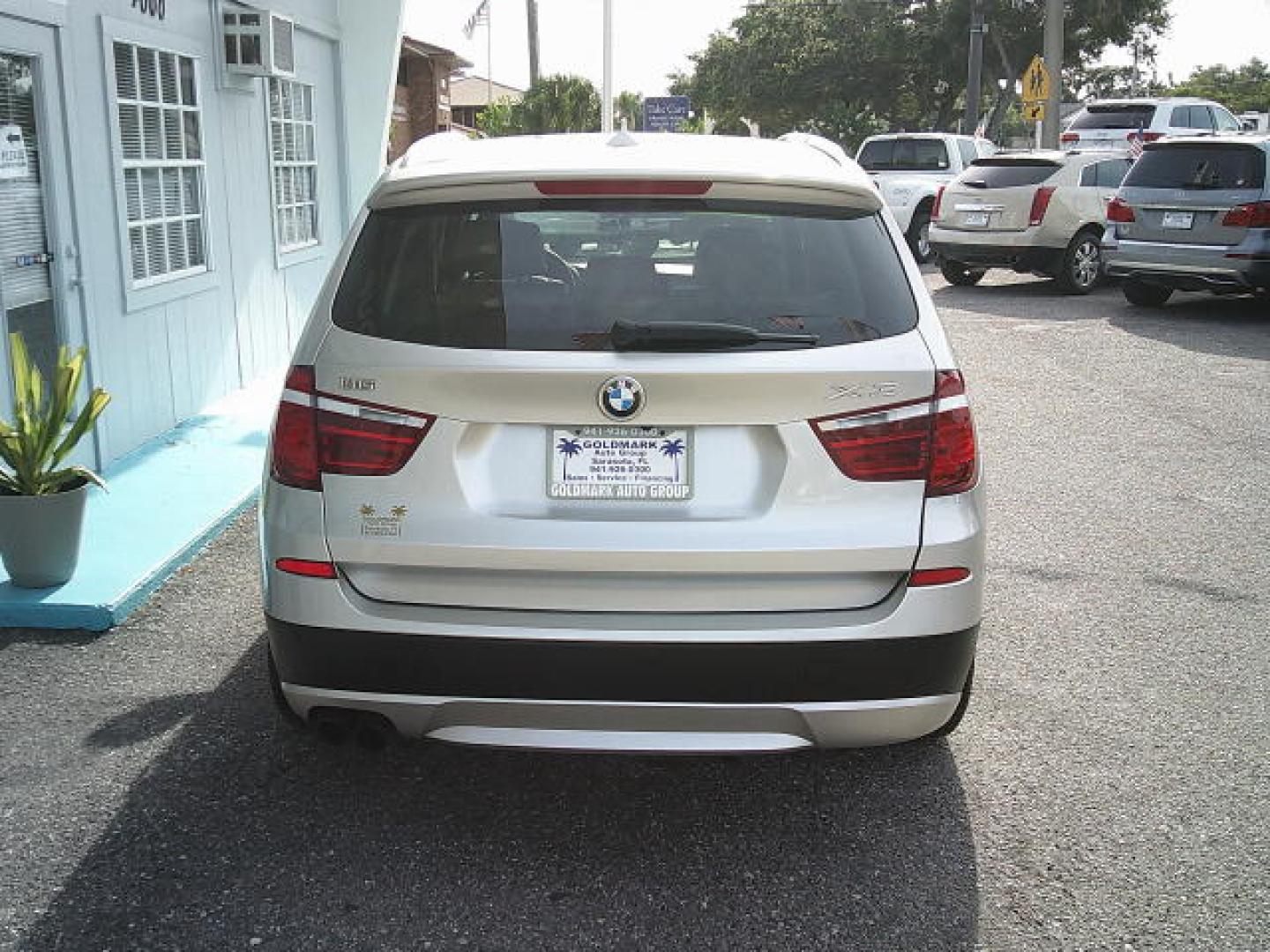 2013 Silver /Tan BMW X3 xDrive28i (5UXWX9C57DL) with an 3.0L L6 DOHC 24V engine, 8-Speed Automatic transmission, located at 4000 Bee Ridge Road, Sarasota, FL, 34233, (941) 926-0300, 27.298664, -82.489151- Photo#5