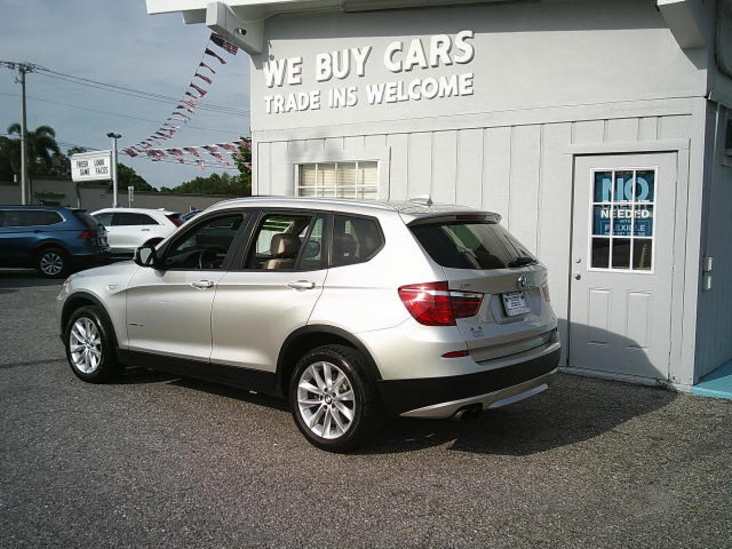 2013 Silver /Tan BMW X3 xDrive28i (5UXWX9C57DL) with an 3.0L L6 DOHC 24V engine, 8-Speed Automatic transmission, located at 4000 Bee Ridge Road, Sarasota, FL, 34233, (941) 926-0300, 27.298664, -82.489151- Photo#2