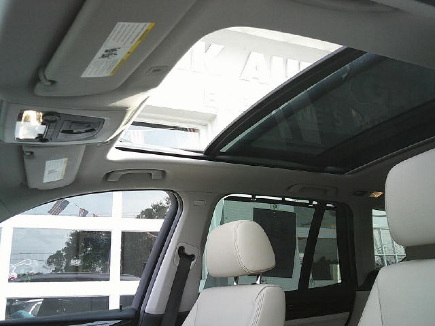2013 Silver /Tan BMW X3 xDrive28i (5UXWX9C57DL) with an 3.0L L6 DOHC 24V engine, 8-Speed Automatic transmission, located at 4000 Bee Ridge Road, Sarasota, FL, 34233, (941) 926-0300, 27.298664, -82.489151- Photo#13