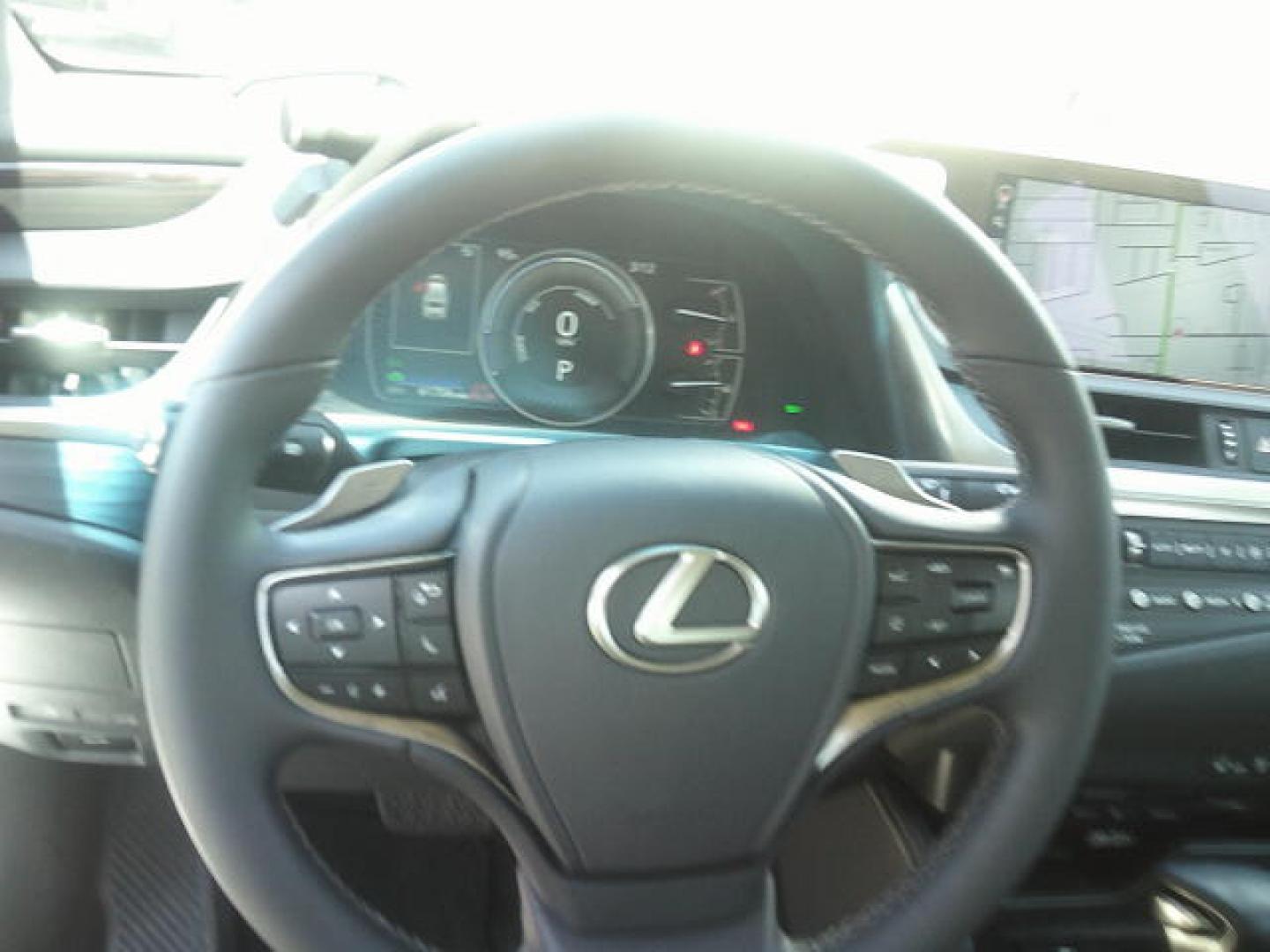 2021 WHITE /Beige Lexus ES 300h Base (58ADA1C19MU) with an 2.5L L4 DOHC 16V HYBRID engine, CVT transmission, located at 4000 Bee Ridge Road, Sarasota, FL, 34233, (941) 926-0300, 27.298664, -82.489151- Photo#20