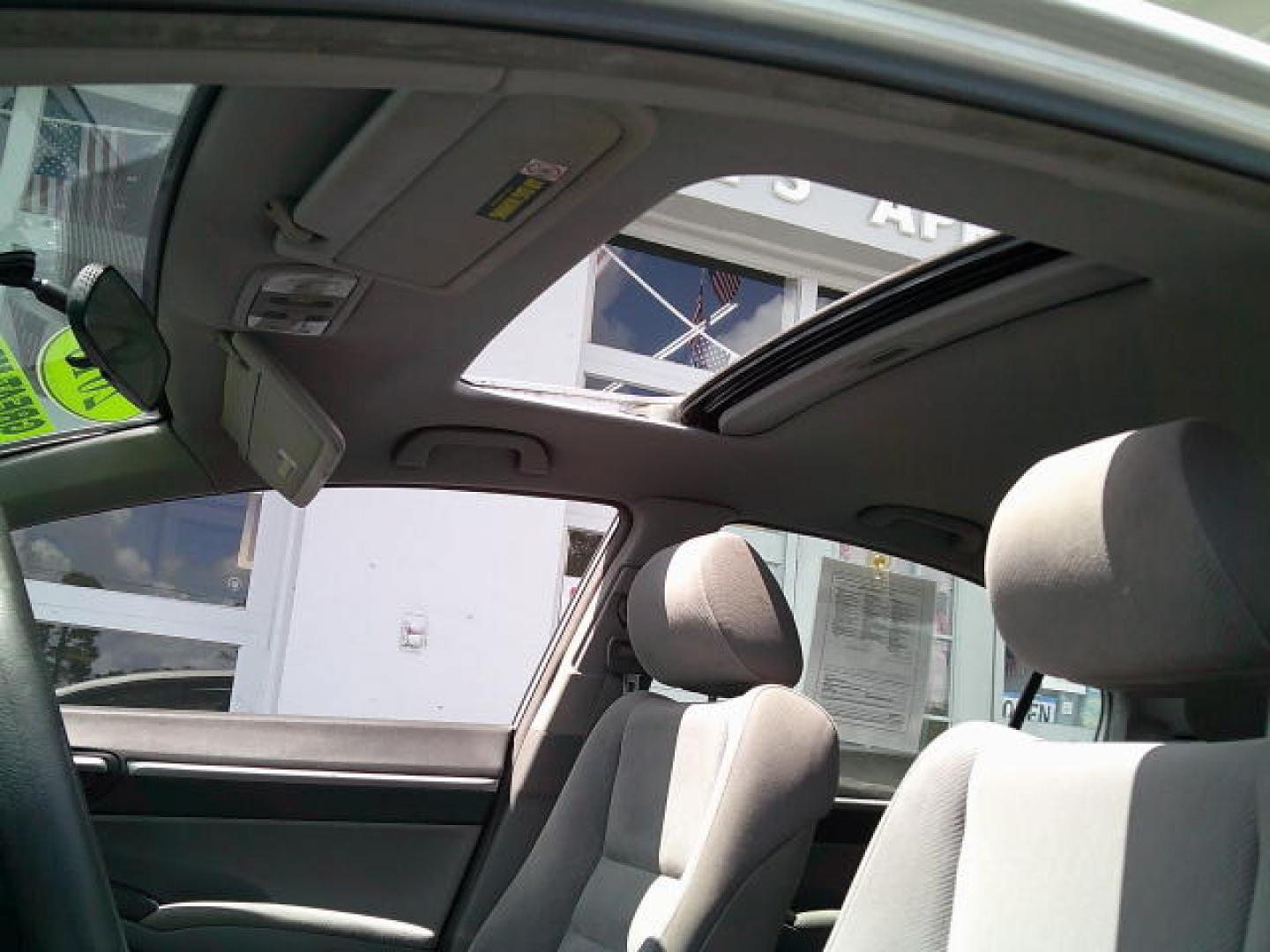 2010 Silver /Gray Honda Civic EX Sedan 5-Speed AT (2HGFA1F83AH) with an 1.8L L4 SOHC 16V engine, 5-Speed Automatic transmission, located at 4000 Bee Ridge Road, Sarasota, FL, 34233, (941) 926-0300, 27.298664, -82.489151- Photo#13